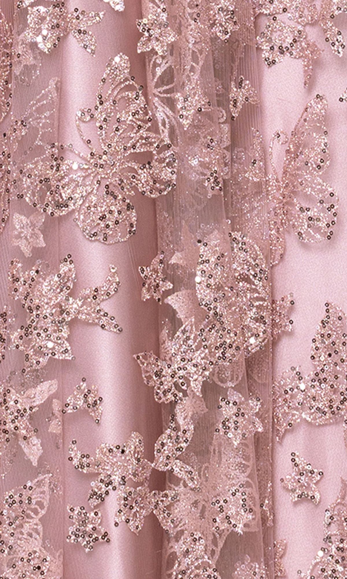 Close-up of pink satin fabric from the Blondie Nites 6007BN long prom dress, featuring a glitter-mesh butterfly pattern with floral embroidery, sequins, and beads for a sparkling corset bodice effect.